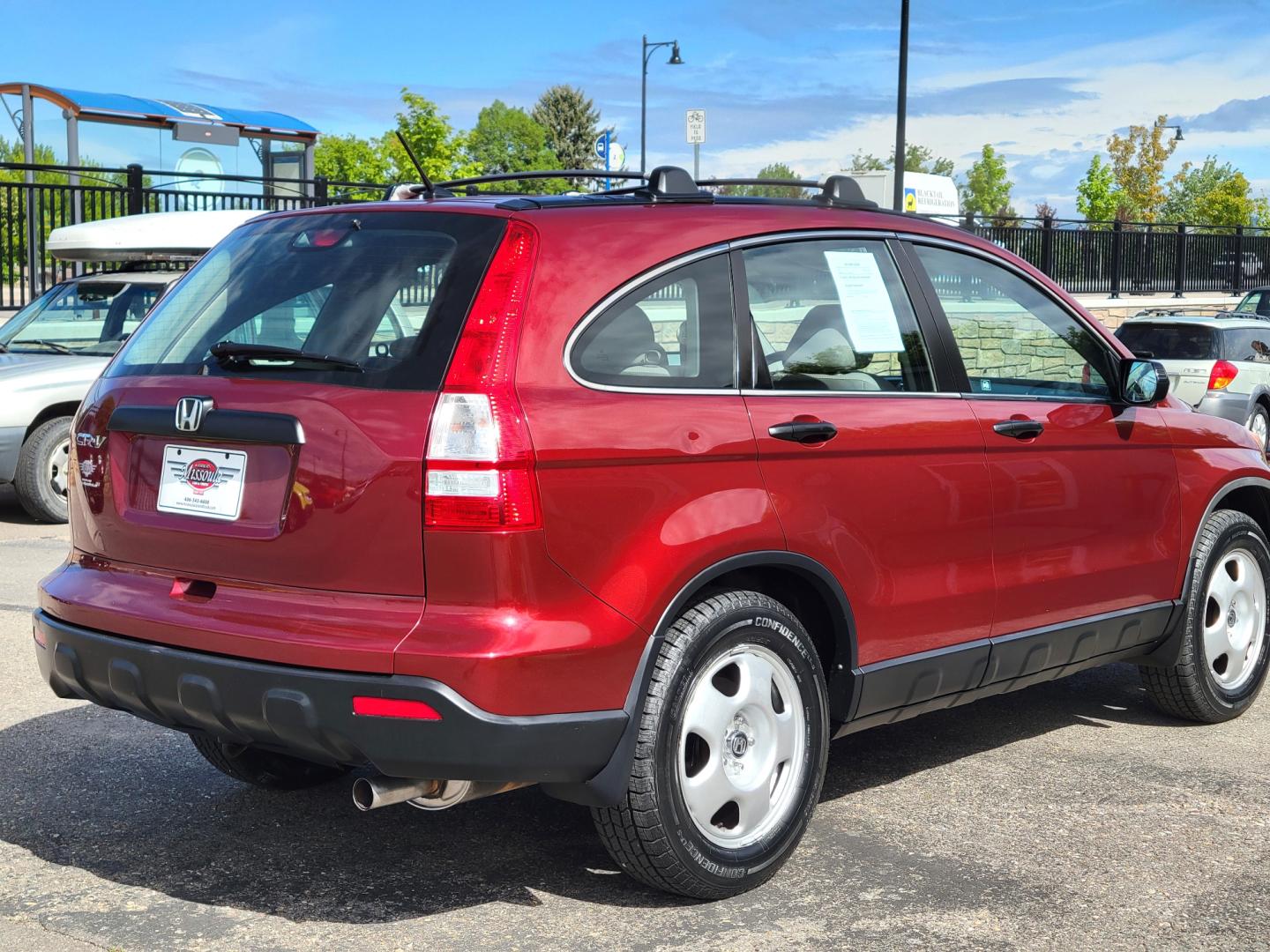 2009 Red /Gray Honda CR-V LX (5J6RE483X9L) with an 2.4L L4 engine, 5 Speed Automatic transmission, located at 450 N Russell, Missoula, MT, 59801, (406) 543-6600, 46.874496, -114.017433 - Great Running AWD SUV. 2.4L I4 Engine. 5 Speed Automatic Transmission. Air. Cruise. Tilt. Power Windows and Locks. New Tires. Roof Rack. Does have a Rebuilt Title so financing is not available. - Photo#5